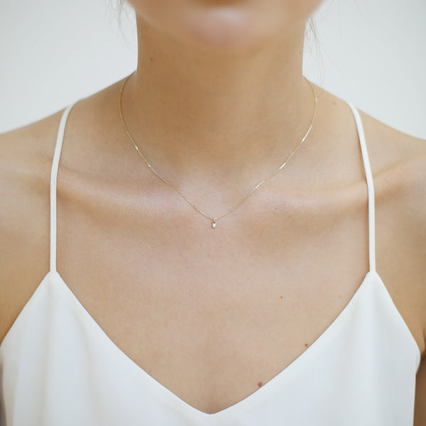 Tiny diamond necklace gold